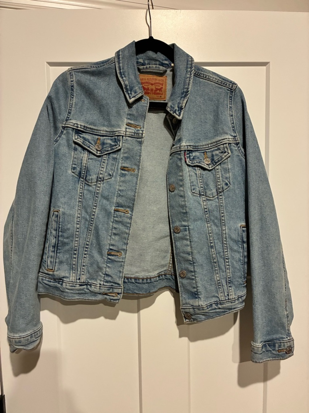Levi's light blue denim jacket with leather logo patch